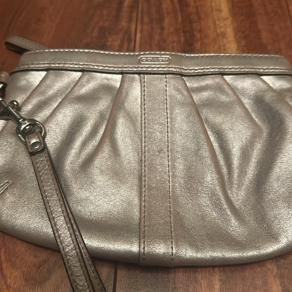 Coach wristlet champagne color